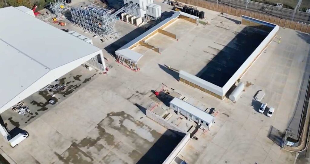 concrete-hardstanding-aerial aerial photo of expansive concrete hardstanding at UK aggregates recycling facility